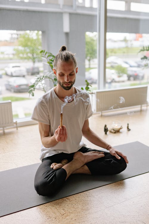 male instructor with incense